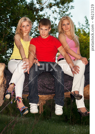 Two attractive blonde and young man 4623129