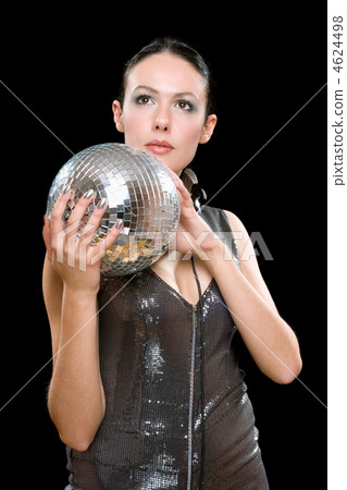 Portrait of young brunette with a mirror ball 4624498