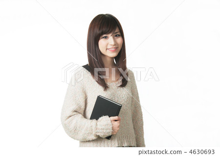 Young woman with a book 4630693