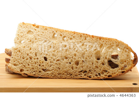 The cut bread on a chopping board 4644363