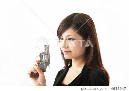 A woman with a gun A woman with a gun 4652647