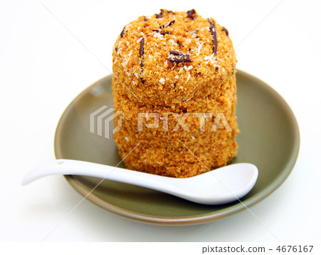 Honey cake with chocolate on a white background Honey cake with chocolate on a white background 4676167