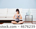 Asian woman practicing yoga at home. 4676239