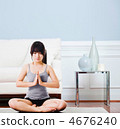 Asian woman practicing yoga at home. 4676240