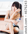Asian woman with water bottle. 4676243