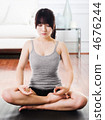 Asian woman meditating. 4676244