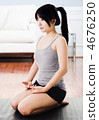 Asian woman practicing yoga at home. 4676250