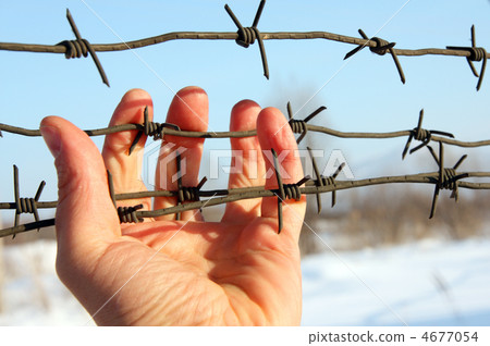 Hand of prison and sky background 4677054