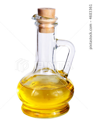 Small decanter with olive oil isolated on the white background Small decanter with olive oil isolated on the white background 4683361
