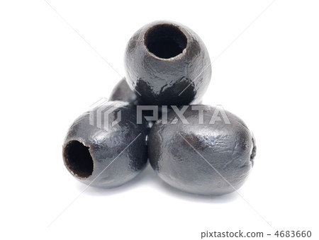 Some black pitted olive fruit close up on white background 4683660