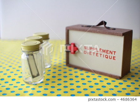 A small bottle for holding medicine; a medicine container A small bottle for holding medicine; a medicine container 4686364