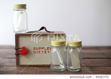 A small bottle for holding medicine; a medicine container A small bottle for holding medicine; a medicine container 4686370