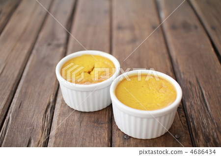 Homemade baked pumpkin pudding made in a cocotte Homemade baked pumpkin pudding made in a cocotte 4686434