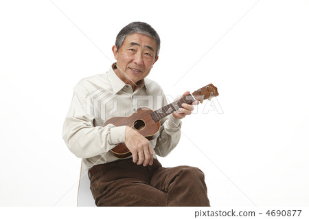 Mature men playing ukulele Mature men playing ukulele 4690877