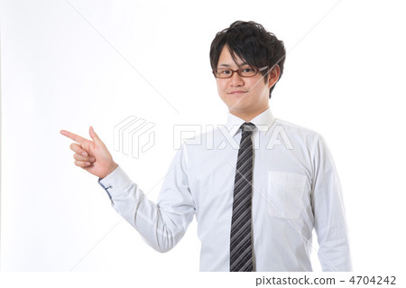 A businessman pointing to the left A businessman pointing to the left 4704242