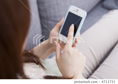 Smartphone in the living room 4711731