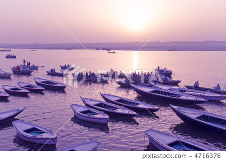 Morning glow and boat on the Ganges River: India / Varanasi Morning glow and boat on the Ganges River: India / Varanasi 4716376