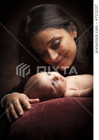 Attractive Ethnic Woman with Her Newborn Baby Attractive Ethnic Woman with Her Newborn Baby 4723287