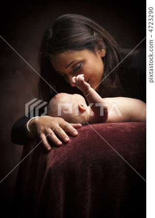 Attractive Ethnic Woman with Her Newborn Baby Attractive Ethnic Woman with Her Newborn Baby 4723290