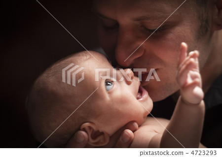 Young Father Holding His Mixed Race Newborn Baby Young Father Holding His Mixed Race Newborn Baby 4723293