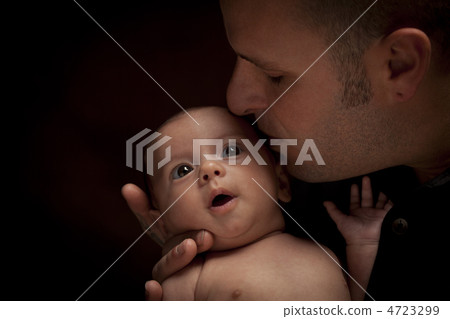 Young Father Holding His Mixed Race Newborn Baby Young Father Holding His Mixed Race Newborn Baby 4723299