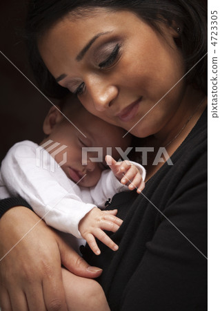 Attractive Ethnic Woman with Her Newborn Baby Attractive Ethnic Woman with Her Newborn Baby 4723305