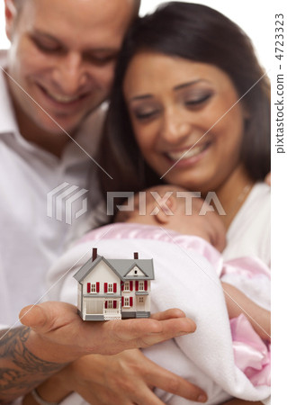 Mixed Race Family with Small Model House Mixed Race Family with Small Model House 4723323