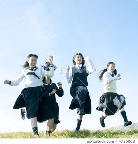 Junior high school students jumping in the meadow Junior high school students jumping in the meadow 4726008