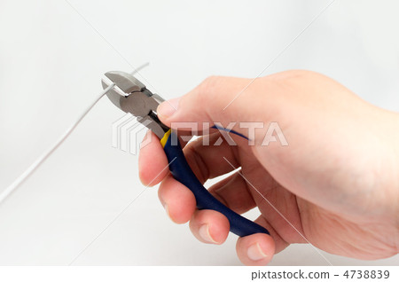 Hand holding the nipper Hand holding the nipper 4738839