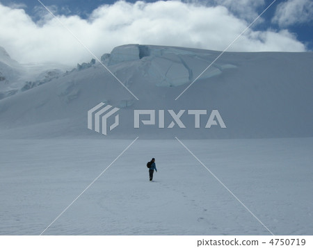 A man heading for a snowy mountain A man heading for a snowy mountain 4750719