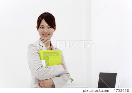 Office Smiling young business woman Office Smiling young business woman 4752458
