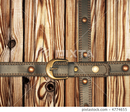 Old wooden boards and leather belt 4774655