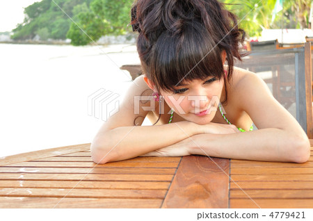 A young woman in bikini enjoying Koh Samet resort A young woman in bikini enjoying Koh Samet resort 4779421