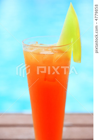 Drinking cocktail by the pool side Drinking cocktail by the pool side 4779858