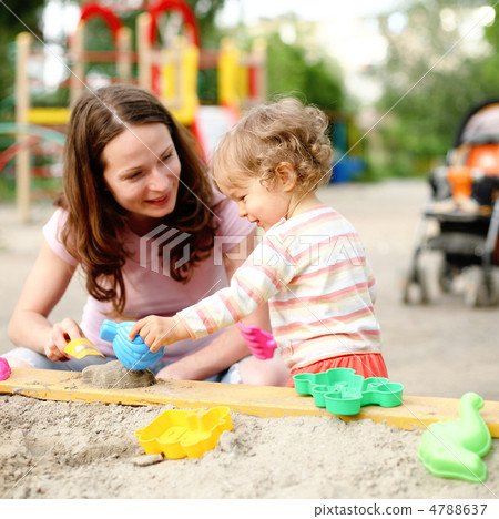 Family on playground 4788637