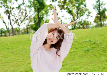 A woman in green A woman in green 4795166