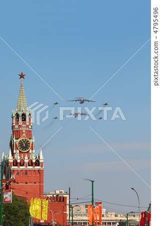 MOSCOW - MAY 9: Il-76, Tu-95ms, Mig-29 airplanes fly on parade o 4795496