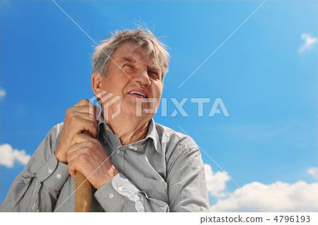 old senior in striped shirt with shove smiling and looking at si old senior in striped shirt with shove smiling and looking at si 4796193