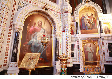 Icons and stand for candles near painting in arch inside Cathedr 4796203