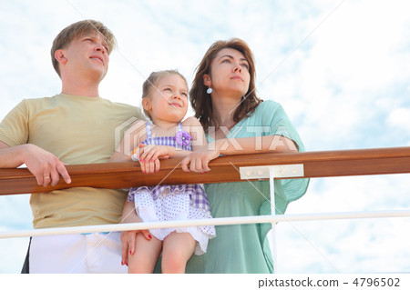 family with daughter standing on cruise liner deck near rail, ch family with daughter standing on cruise liner deck near rail, ch 4796502