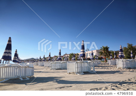 sun lounger with umbrellas are neatly built rows in  morning on 4796938