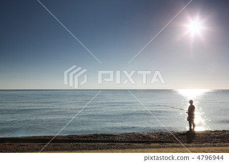Silhouette of man of fisherman which stands ashore and fishes Silhouette of man of fisherman which stands ashore and fishes 4796944
