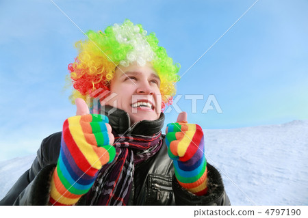 Man in wig and gloves of clown looks in sky and shows gestures h Man in wig and gloves of clown looks in sky and shows gestures h 4797190