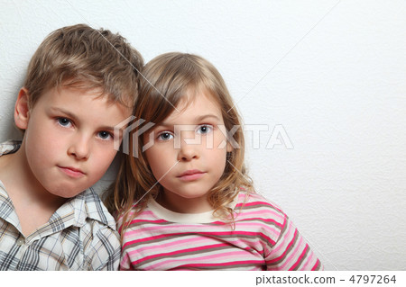 Portrait of thoughtful little girl and boy, they put heads on ea Portrait of thoughtful little girl and boy, they put heads on ea 4797264