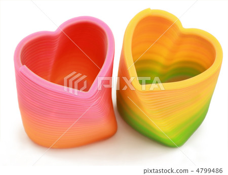 Two springs in form heart lie on white background Two springs in form heart lie on white background 4799486