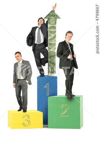 three businesmen on wood toy blocks victory podium with dollar a three businesmen on wood toy blocks victory podium with dollar a 4799607