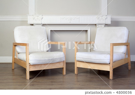 two white chairs and beautiful ornate decorative plaster molding 4800036