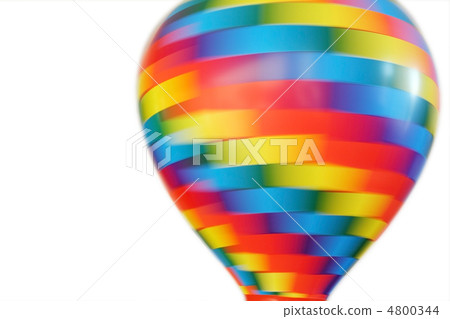multicolored hot-air balloon toy whirling isolated on white back 4800344