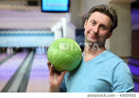 Portrait of man with ball for bowling 4800988