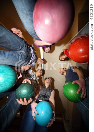 Girls and youths stand in circle and everybody hold ball for bow Girls and youths stand in circle and everybody hold ball for bow 4801219
